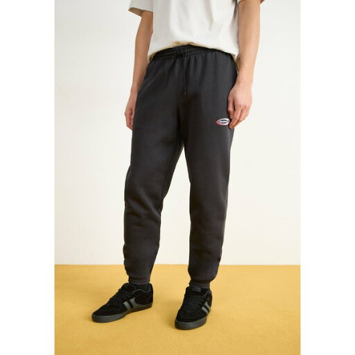 リーボック メンズ カジュアルパンツ ボトムス BRAND PROUD PANT - Tracksuit bottoms - black リーボック メンズ カジュアルパンツ ボトムス BRAND PROUD PANT - Tracksuit bottoms - black