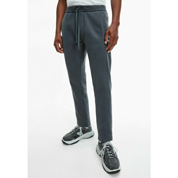 カルバンクライン メンズ サンダル シューズ JOGGERS - Tracksuit bottoms - gray pinstripe