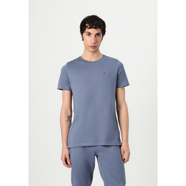 トミーヒルフィガー メンズ カジュアルパンツ ボトムス TJM SLIM S FLAG - Tracksuit bottoms - blue moment