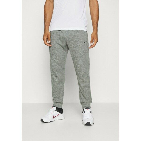 ナイキ メンズ カジュアルパンツ ボトムス PANT TAPER - Tracksuit bottoms - dark grey heather/particle grey/black