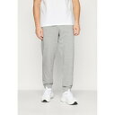 ヒュンメル メンズ サンダル シューズ PULSE REGULAR PANTS - Tracksuit bottoms - grey