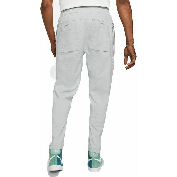 ナイキ メンズ カジュアルパンツ ボトムス Nike Men's Sportswear Woven Utility Pants Lt Smoke Grey