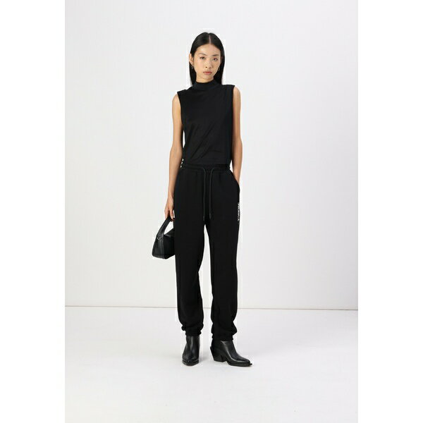 カール ラガーフェルド ジーンズ レディース カジュアルパンツ ボトムス TEXT LOGO SLIM - Tracksuit bottoms - black