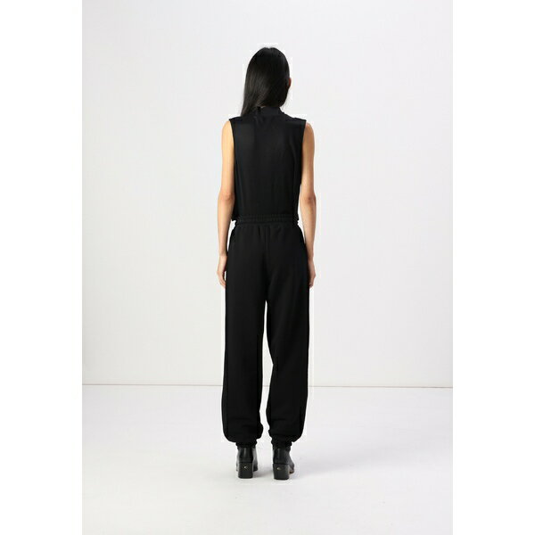 カール ラガーフェルド ジーンズ レディース カジュアルパンツ ボトムス TEXT LOGO SLIM - Tracksuit bottoms - black