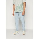 アンダーアーマー メンズ バスケットボール スポーツ UNSTOPPABLE TAPERED PANTS - Tracksuit bottoms - harbo...