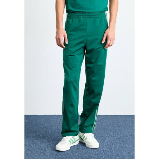 アディダスオリジナルス メンズ カジュアルパンツ ボトムス FIREBIRD - Tracksuit bottoms - collegiate green アディダスオリジナルス メンズ カジュアルパンツ ボトムス FIREBIRD - Tracksuit bottoms - collegiate green