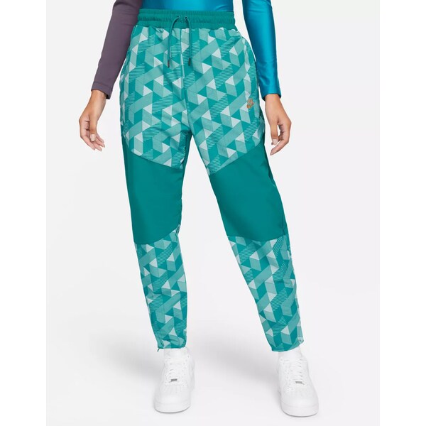 ナイキ レディース カジュアルパンツ ボトムス Nike X Serena Design woven geo print cuffed pants in teal Teal