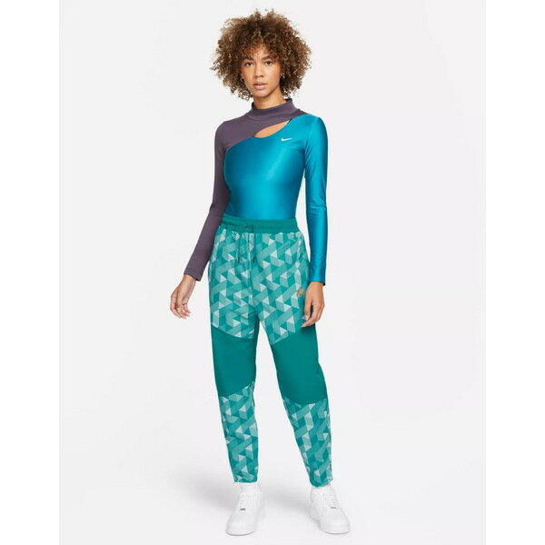 ナイキ レディース カジュアルパンツ ボトムス Nike X Serena Design woven geo print cuffed pants in teal Teal