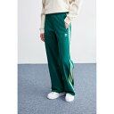 アディダスオリジナルス レディース カジュアルパンツ ボトムス BECKENBAUER - Tracksuit bottoms - collegiate green
