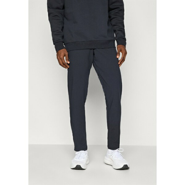 アンダーアーマー メンズ カジュアルパンツ ボトムス VANISH TAPERED PANTS - Tracksuit bottoms - black/castlerock