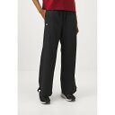 アンダーアーマー レディース フィットネス スポーツ RIVAL WIDE LEG PANT - Trousers - black/white
