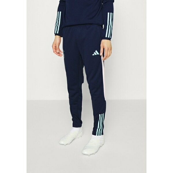 アディダス メンズ カジュアルパンツ ボトムス AJAX AMSTERDAM TIRO 23 - Tracksuit bottoms - collegiate navy/clear mint