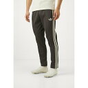 アディダスオリジナルス メンズ カジュアルパンツ ボトムス DEUTSCHLAND BECKENBAUER TRACK PANT - Tracksuit bottoms - utility black