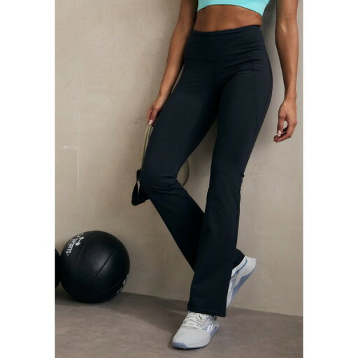 リーボック レディース カジュアルパンツ ボトムス LUX MINI FLARE PANT - Tracksuit bottoms - black リーボック レディース カジュアルパンツ ボトムス LUX MINI FLARE PANT - Tracksuit bottoms - black