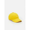 W[_ Y Xq ANZT[ CLUB JUMPMAN - Cap - yellow ochre/white