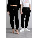 ヴェルサーチ レディース カジュアルパンツ ボトムス JOGGERS I HEART BAROQUE GOTS UNISEX - Tracksuit bottoms - black