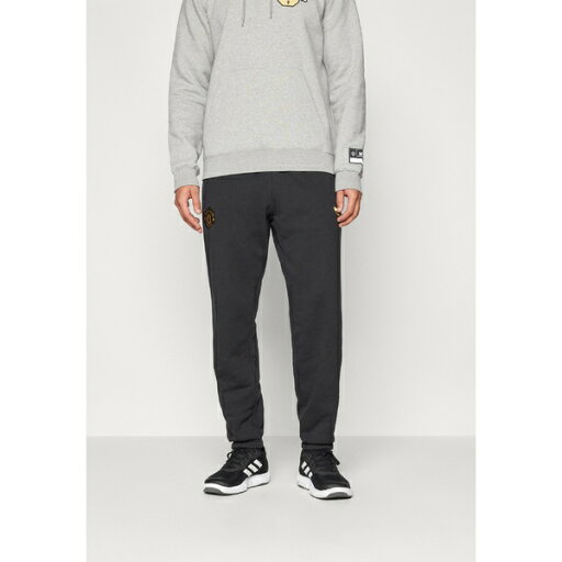 アディダスオリジナルス メンズ カジュアルパンツ ボトムス MANCHESTER UNITED CHINESE NEW YEAR - Club wear - black アディダスオリジナルス メンズ カジュアルパンツ ボトムス MANCHESTER UNITED CHINESE NEW YEAR - Club wear - black