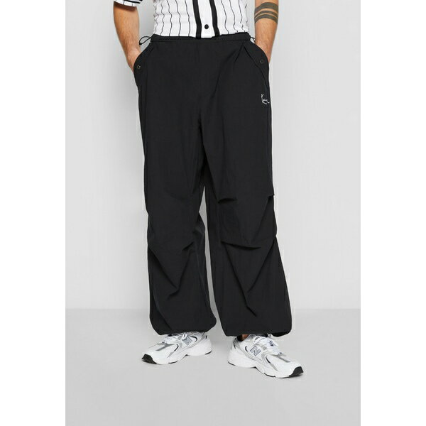 カール カナイ メンズ カジュアルパンツ ボトムス SMALL SIGNATURE PARACHUTE - Trousers - black