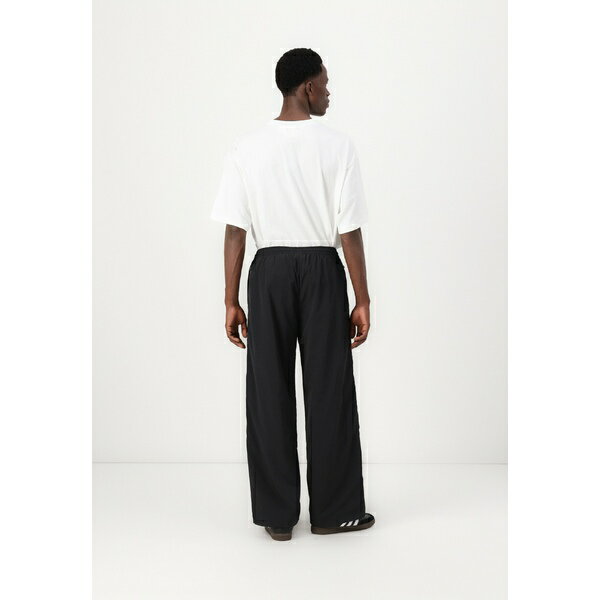 アディダスオリジナルス メンズ カジュアルパンツ ボトムス TRACKPANT - Tracksuit bottoms - black