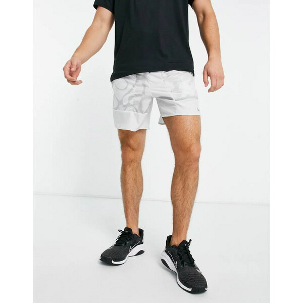 ナイキ メンズ カジュアルパンツ ボトムス Nike Running Dri-FIT Wild Run Stride 7-Inch unlined all over print shorts in gray Gray