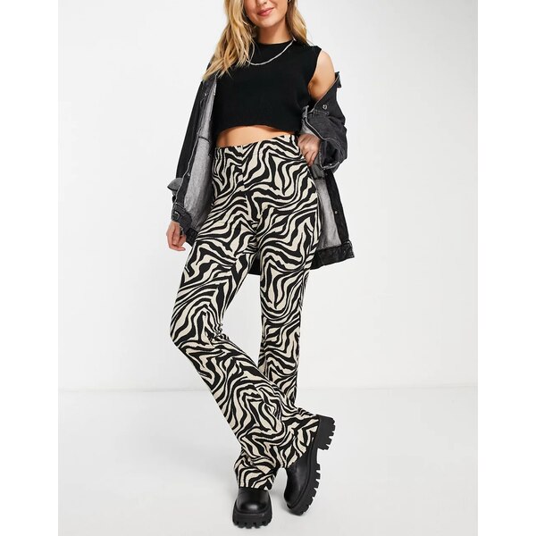 オンリー レディース カジュアルパンツ ボトムス Only jersey flare pants in zebra print Multi