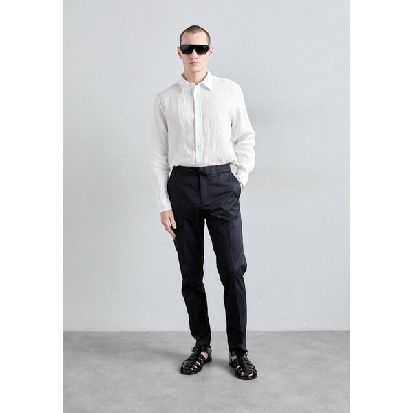 タイガー オブ スウェーデン メンズ カジュアルパンツ ボトムス TANNEN - Chinos - light ink