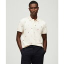 トミー ヒルフィガー メンズ シャツ トップス Men's Regular Fit Allover Flag Polo Shirt Ivory Petal