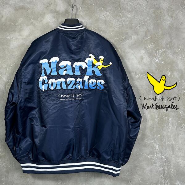 What it isNt MARK GONZALES 「Patch Logo Stadium Jumper Navy」マークゴンザレス スタジアム ジャンパー ジャケット スタジャン アウター ネイビー ビッグシルエット アメカジ ストリート メンズ 2023年 秋冬新作