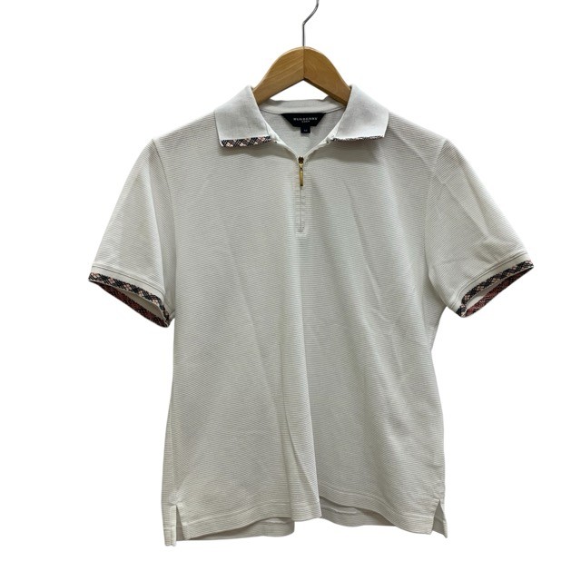 商品名 BURBERRY GOLF/バーバリーゴルフ/ハーフジップ/ポロシャツ/半袖/サイズM/レディース/ホワイト/FC3724 管理番号 PD1U3NCB0150 コンディション・サイズなど この商品の参考ランクは　中古AB N 使用されていない未使用・新古品になります。 S 数回程度の使用品で、ほとんど使用感を感じない美品です。 SA 使用感があまりなく、全体的に綺麗な状態のお品です。 A 使用感は少しありますが、程度良好のお品です。 AB 多少使用感はありますが、通常の中古品の範囲内です。 B 使用感のあるお品ですが、通常の使用には差し支えありません。 C 少し難ありのお品です。場合によってはお直しが必要です。 ジャンク 難ありのお品です。お直しの必要があります。 【コンディション】 多少の着用感はございますが、 目立つ汚れや大きな損傷はお見受けできません。 【サイズ】：M 【素材】：綿 【色】：ホワイト 【着丈】　約 59.3cm 【総丈】　約 cm 【肩幅】　約 41cm 【裄丈】　約 cm 【身幅】　約 50cm 【袖丈】　約 21.5cm サイズ違いによる返品・交換は致しかねます。 取扱い店舗 エコライフ 岡場店 TEL　078-982-8803 特定商取引法・問い合わせ等 会社名 株式会社エコスモ 運営統括責任者 尾山　亮 古物商許可証 大阪府公安委員会　第621130140227号 住所 兵庫県神戸市北区藤原台中町1－4－1 ステップガーデンA棟1階 電話番号 078-982-8803 メールアドレス eco_eco_eco_life@yahoo.co.jp カテゴリ：ブランド, 衣料品, トップス