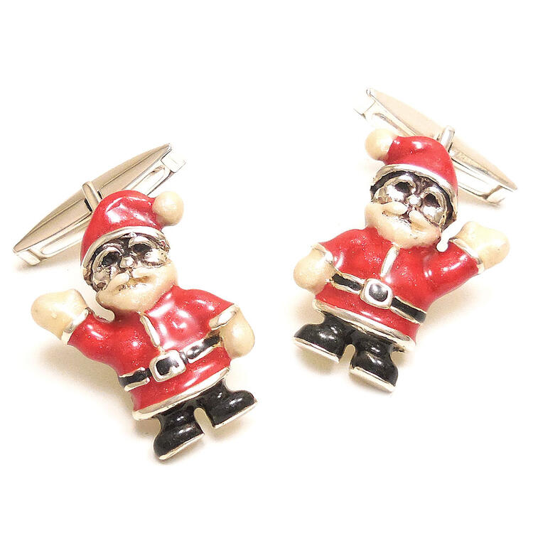 シルバーの上品な光沢がユニークな高級感をだだよわせる、イタリア：サツルノ社製の、サンタクロースの銀製カフスボタン（カフリンクス）です。 クリスマスシーズンの人気者、サンタクロース。モチーフ部分と留め具部分の間接は可動します（固定は出来ません...