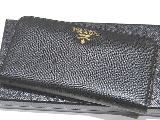 プラダ ラウンドファスナー 長財布 ☆ 1ML506 サフィアーノ レザー ブラック ゴールド金具 メンズ レディース 兼用 PRADA ▼8A(4.0)