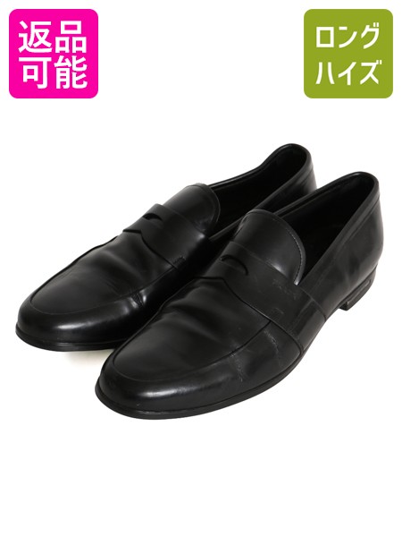 商品説明 アメリカで購入したUSEDの商品です。 プラダ のペニーローファーです。 PRADA 1913年創業 イタリア ミラノ発のラグジュアリーブランド 世界的ブランドですの説明は割愛します。 素材は、アッパーに光沢のある樹脂加工されたカーフレザー ソフトな質感で、履きこんでいくうちに経年変化を楽しめます。 インソール は、本革レザー アウトソールは、本革とハーフラバーソール 雨の日も滑りにくく、天候を問わず履いて頂けます。 サドル部分にワンポイントのロゴ型押し ヒール側面にもロゴ入りの埋め込み式メタルプレート 派手なロゴは一切入らない、 さりげないながらも高級感を漂わせる 細部までしっかりとこだわりを感じる 流行に左右されない洗練されたスタイリッシュな 使い勝手の良いシンプルなデザイン 合わせやすい、人気のブラック ドレススタイルからカジュアル、ビジネスシーンまで使える 長く愛用して頂ける商品です コンディション レザー特有の履きジワ、ソールに多少の減りがあります 使用感はありますが、美観を損なう物ではありません。(写真参照) カラー ブラック サイズ 表記サイズ UK71/2 メンズ 26.5cm 程(実寸をご確認ください) アウトソール 29cm 横幅最大 10cm 高さ 8cm【踵を含む】 補足 （計測は全て平置きでの計測になります。多少の誤差はご了承下さい） サイズの測り方についてはこちら 商品番号 k-jyd33y26n08 当店について 当店の商品は、国内の買い取りなどは行なわず、私たちが直接アメリカから買い付けてきた新品 デッドストック 等の US古着、インポート オンリーの商品です。靴 鞄 帽子 ファッション 小物 などの全身コーディネートできる物春服 夏服 春夏 秋冬、秋服、冬服 など様々な季節　オシャレ おしゃれ かわいい カワイイ かっこいい 流行 トレンド 旬 シンプル インパクト カジュアル フォーマルストリート 定番 人気 など様々なスタイルに対応できる商品特に アメリカン カジュアル ( アメカジ ) ストリートアウトドア ワーク ミリタリー と言った機能性 に優れ長く愛用できる物を幅広く取り揃えています。大切な人の 贈り物 ( ギフト )誕生日 母の日　父の日　敬老の日　クリスマス　ハロウィン バレンタイン　就職祝い 入学祝い 進学祝い 結婚祝いにもお使い頂ける、心のこもった 1点物 もお探しいただけます。ひとつひとつ厳選した幅広いジャンルの商品お楽しみください。 商品について 一見して分かる目立つヨゴレやダメージは商品画像や商品説明に記載はしていますが 着用に支障が無いと判断した物や裏側等の着用時見えない場所、古着慣れされている方 なら問題無い範囲内と判断したヨゴレ、小さなダメージの説明は省いている場合があります。 (その様な場合でもこちらの判断で良品、美品と記載している物もあります) 見えない場所や細かいヨゴレ、ダメージの気になる方はご購入前に必ずご相談下さい。 サイズについては多少の誤差はご了承願います。 撮影時の光や環境、ご使用のブラウザによって実際の色と異なる場合があります。 写真と商品説明文を確認して、少しでも気になる点があれば必ずご入札前にご質問下さい。 在庫について 掲載商品に関しましては、実店舗でも同時に販売しており在庫の有無が反映されいていないことがあります。自動返信メールと別に、在庫の有無をメールでご連絡差し上げます。 在庫がない場合は、キャンセルのメールを配信させて頂いておりますこと、予めご了承ください。 営業時間について AM10:00 ~ PM16:00 上記時間内でもお問い合わせにお答え出来ない場合もあります。 急遽お休みを頂く場合もございますので気になる点はお早めにご質問下さい。 前もってお休みをお知らせ出来る場合は自己紹介欄等に記載させて頂きますのでご確認下さい。