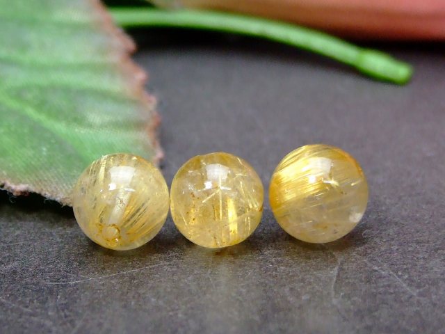 乐天商城 - 55164A　　今月の半額 1粒売り 7mm～8mm A タイチンルチルクォーツ 針水晶 送料無料有 天然石 パワーストーン