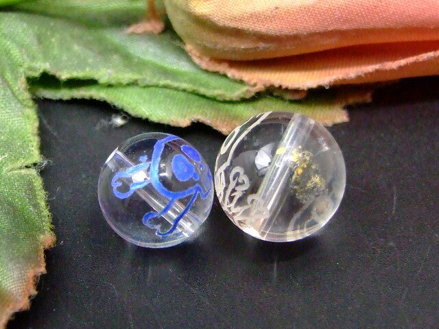 66897　 10mm〜12mm わけあり 水晶 彫り 髑髏 2粒セット クリスタル クォーツ 送料無料有 天然石 パワーストーン