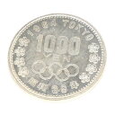 ◆商品名◆昭和39年 東京オリンピック 1000円銀貨 TOKYO 並品 記念貨幣 1964年◆サイズ◆直径:35mm 重さ:20g◆付属品◆本体のみ（付属品はありません）◆ランク◆中古A〜Bランク/USED多少のくすみや小キズ、汚れや変色などがある並品です。◆スタッフコメント◆1964年東京オリンピック記念1000円銀貨です。コレクションにいかがでしょうか。この他当店ではいろいろな記念硬貨を取り扱っておりますので、ぜひご覧くださいませ。◎掲載写真はデジタルカメラで撮影しております。閲覧環境により、実際の商品と若干色合いが異なる場合がございます。◎サイズは実測による概算値を記載しております。実際の商品と多少の誤差がございますことをご了承ください。[古銭、記念メダル、切手][JAN: ]