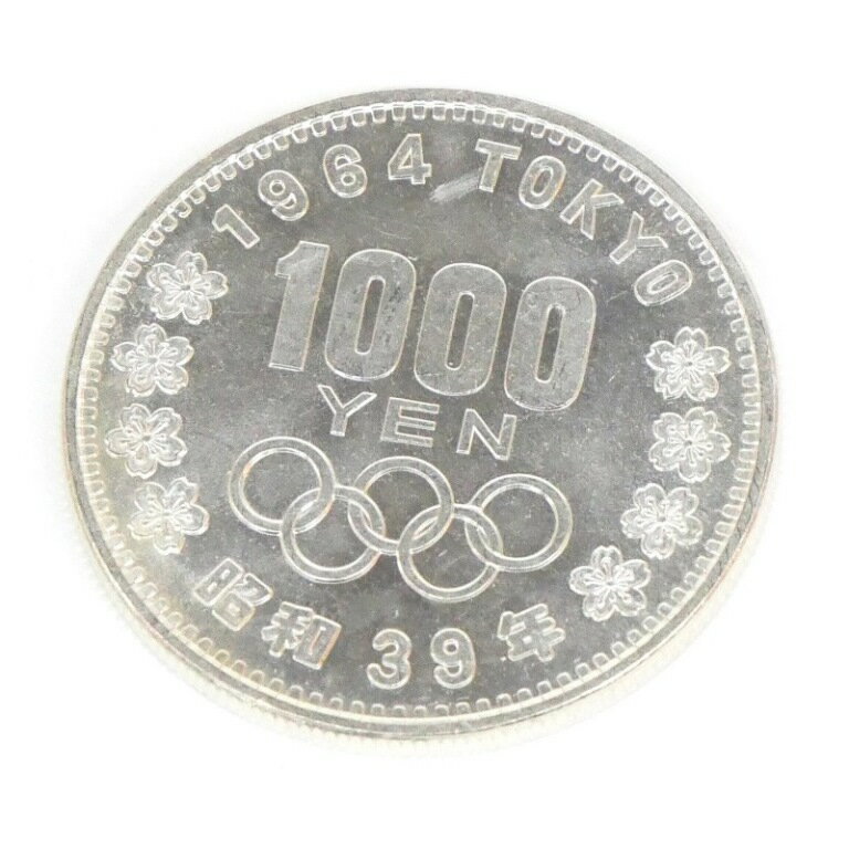 ◆商品名◆昭和39年 東京オリンピック 1000円銀貨 TOKYO 並品 記念貨幣 1964年◆サイズ◆直径:35mm 重さ:20g◆付属品◆本体のみ（付属品はありません）◆ランク◆中古A〜Bランク/USED多少のくすみや小キズ、汚れなどがある並品です。◆スタッフコメント◆1964年東京オリンピック記念1000円銀貨です。コレクションにいかがでしょうか。この他当店ではいろいろな記念硬貨を取り扱っておりますので、ぜひご覧くださいませ。◎掲載写真はデジタルカメラで撮影しております。閲覧環境により、実際の商品と若干色合いが異なる場合がございます。◎サイズは実測による概算値を記載しております。実際の商品と多少の誤差がございますことをご了承ください。[古銭、記念メダル、切手][JAN: ]