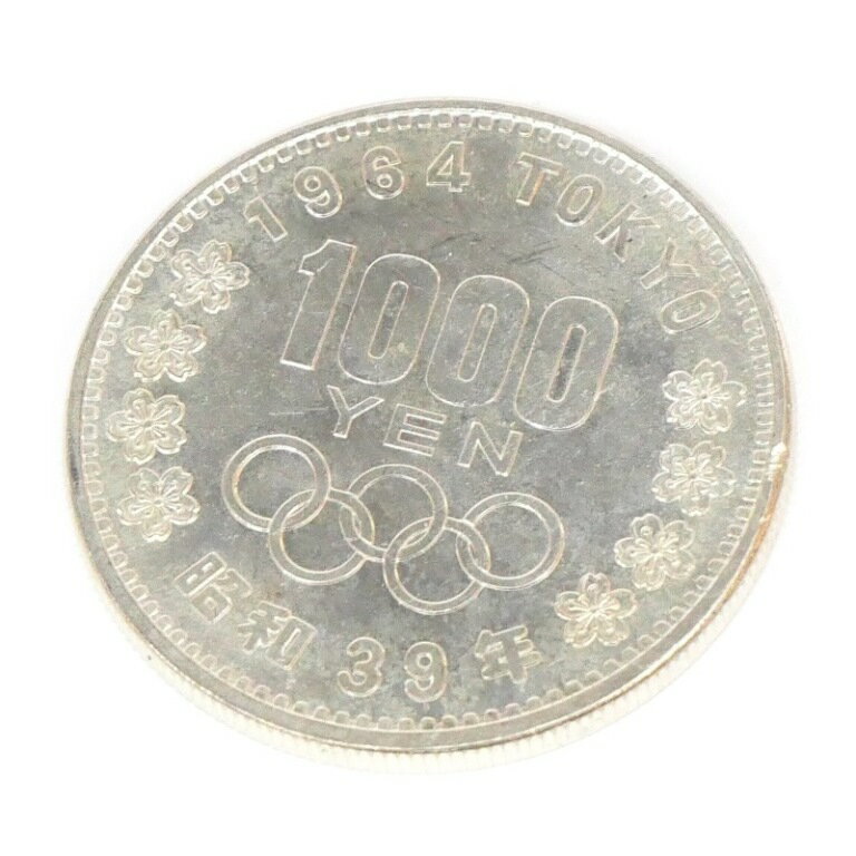 ◆商品名◆昭和39年 東京オリンピック 1000円銀貨 TOKYO 並品 記念貨幣 1964年◆サイズ◆直径:35mm 重さ:20g◆付属品◆本体のみ（付属品はありません）◆ランク◆中古A〜Bランク/USED多少のくすみや小キズ、汚れなどがある並品です。◆スタッフコメント◆1964年東京オリンピック記念1000円銀貨です。コレクションにいかがでしょうか。この他当店ではいろいろな記念硬貨を取り扱っておりますので、ぜひご覧くださいませ。◎掲載写真はデジタルカメラで撮影しております。閲覧環境により、実際の商品と若干色合いが異なる場合がございます。◎サイズは実測による概算値を記載しております。実際の商品と多少の誤差がございますことをご了承ください。[古銭、記念メダル、切手][JAN: ]