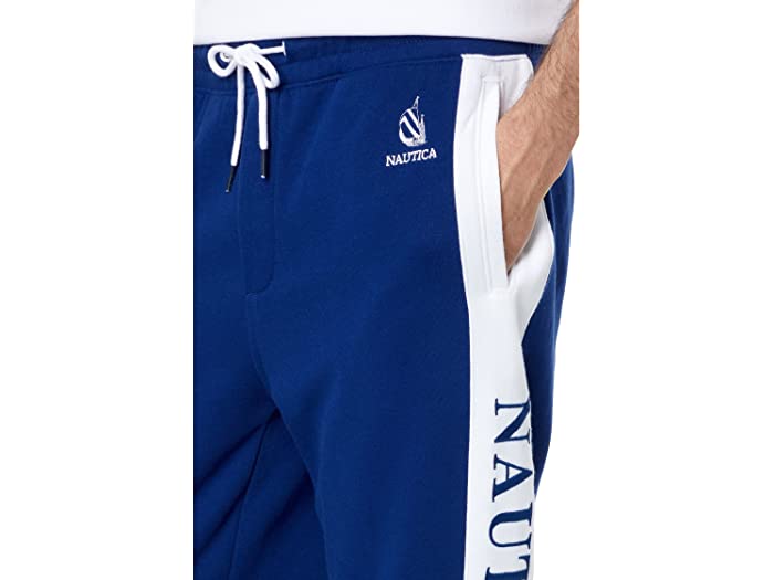 (取寄)ノーティカサステナブリークラフテッドリイシューカラーブロックロゴジョガーNauticaSustainablyCraftedReissueColor-BlockLogoJoggersBlueDepths