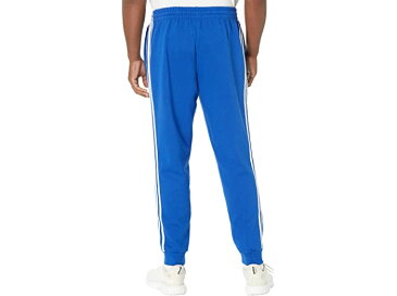(取寄) アディダス メンズ adidas men Essentials 3-Stripes Tapered Cuff Fleece Pants Team Royal Blue/White