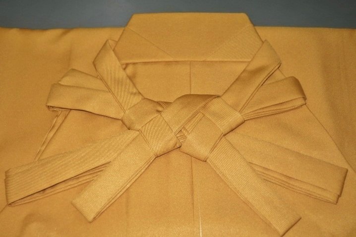 限定入荷・新色の無地袴【紐下91】 化繊馬乗袴 枇杷色のお召調 К家庭洗濯OK 弓道茶道能楽稽古