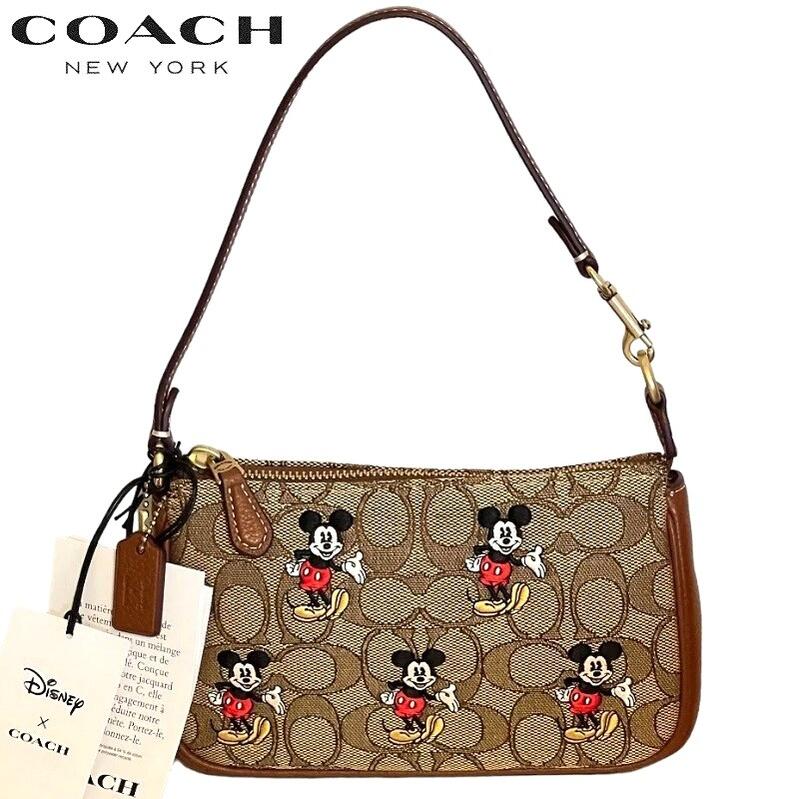 ディズニー 【SALE 2023新作 COACH】コーチ 2023新作 ディズニー コラボ Disney X Coach ミッキーマウス スマホ ショルダーバッグ ハンドルポーチ ミニバッグ COACH ファクトリー ノリータ 19 シグネチャー ジャカード ミッキーマウス プリント カーキ レッドウッド マルチ 正規品