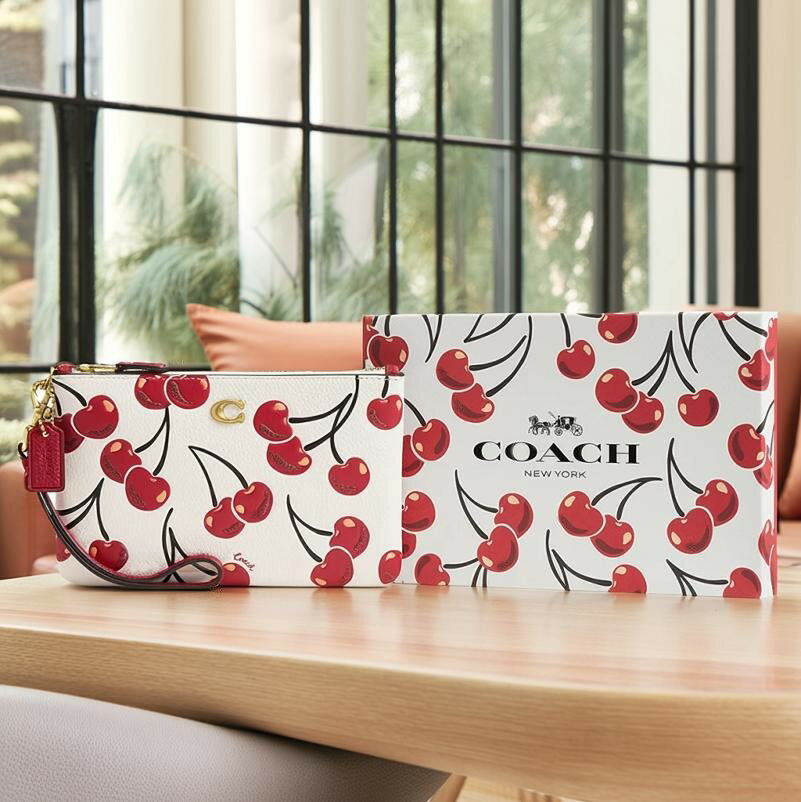 コーチCOACHリストレットポーチ...