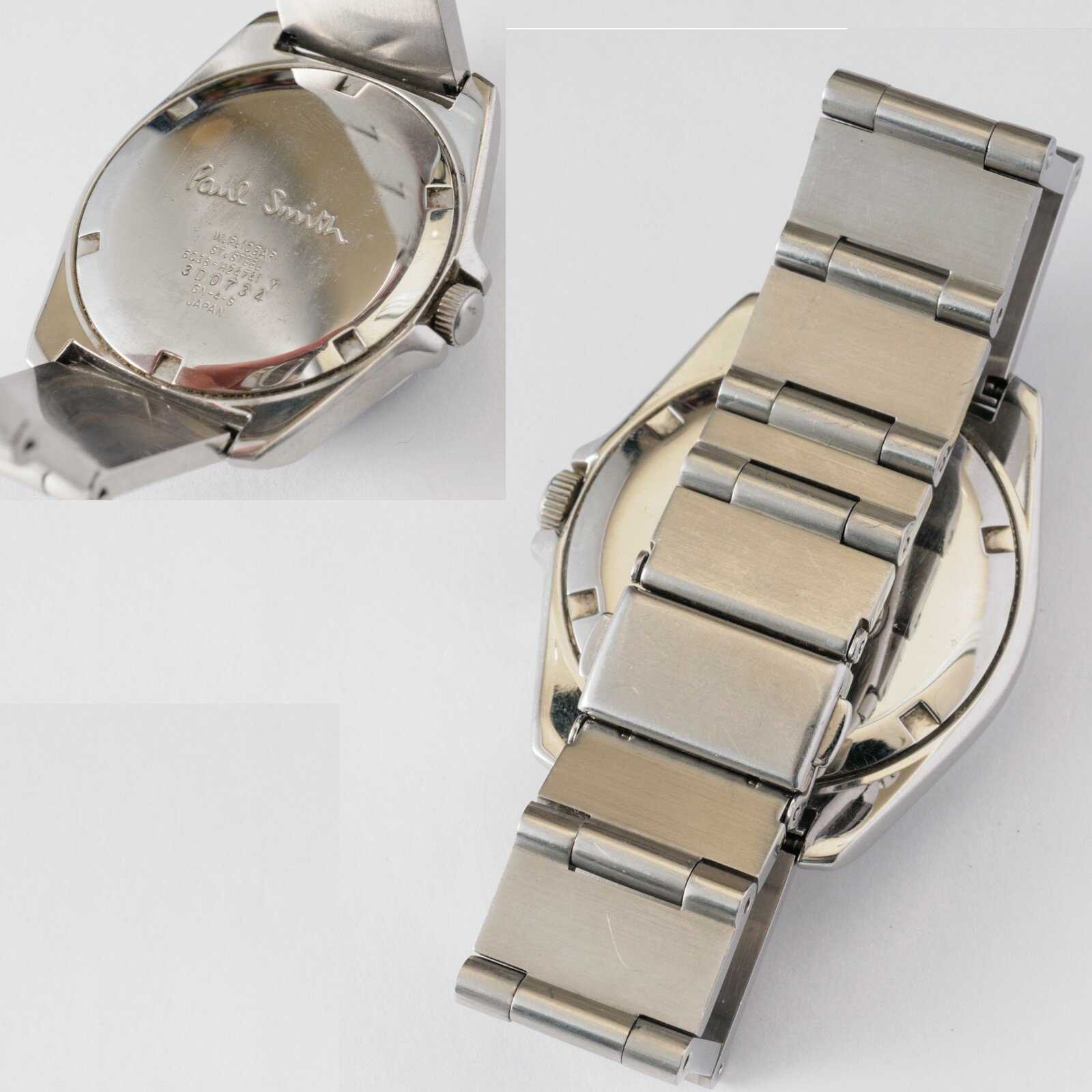 【中古】本物ポールスミス紳士用紫色文字盤x銀色お洒落なキャタピラ式時計　1か月保証付き ○A7-87