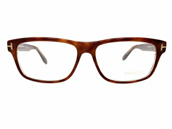 ブランド【トムフォード TOM FORD】についてTOM FORD（トムフォード）は、デザイナー トム・フォードが2005年にスタートさせたアメリカ発のラグジュアリーブランド。トム・フォードは GUCCI や Yves Saint Laurent のクリエイティブディレクターとしてブランド再生を成功させたことで知られ、その後自身のブランドを設立しました。アイウェアはイタリアのアイウェアメーカー MARCOLIN（マルコリン）が製造を担当しており、フロントからテンプルにかけて配置された「T字のメタルパーツ」が象徴的なデザインとして知られています。クラシックなシェイプをベースに、厚みのあるフレームや洗練されたシルエットでラグジュアリーな雰囲気を演出するアイウェアとして人気を集めています。商品説明元グッチのクリエイティブ・ディレクターで、ファッション業界における数々の賞を受賞する巨匠、トムフォード。2009年にはクリストファー・イシャーウッドの小説を原作とする映画『シングルマン』で映画監督を務めるなど活躍の幅を広げつつ、自らの名を冠したブランド、TOM FORDを主宰。モデルTF5320は、やや大ぶりで、ワイドなスクエア型のセルフレームです。前面はラインが掘られたボーダー風の質感。べっ甲柄の裏面にはクリア生地がラミネートされています。バネ蝶番を搭載し掛け心地も抜群の一本です。フロントサイドからテンプルにかけて、鎮座するTマークがトムフォードのアイコン。ラグジュアリー&amp;ファッショナブルな一本です。参考定価：52,920円レンズ横幅：56mm状態：SD 表記についてレンズ縦幅：38mmカラー：鼈甲レンズ間鼻幅：15mmフレーム材質：セル（アセテート）フレーム正面全体幅：141mmフレーム種類：スクエアフレーム耳かけ部分：145mmフレーム重量：レンズ装着時 32g付属レンズ：純正レンズ・ディスプレイレンズレンズカーブ：4付属ケース：当店オリジナルケース状態追記未使用品ですが、メタルバーツに変色がございます。画像動画でご確認ください。※お値段はフレームのみのお値段になります。特にレンズのご注文が無い限り、付属レンズ欄に表記させていただいてますレンズでお送りさせていただきます。付属レンズに「度なしのカラーレンズ」「度なしのクリアレンズ」と表記されているものはそのままお使いいただけます。「デモレンズ（展示用レンズ）」は刻印などがあり、そのままでは使用できません。仮に刻印などが入っていなくとも、まったくコーティングなど入っていない、あくまで展示用のレンズですので、新たにレンズを作成されることをお勧めいたします。「レンズ無し」「度入りのクリアレンズ」「度入りのカラーレンズ」と書いてあるものは、当店もしくは、お近くのメガネ屋さんで、ご自身にあったお度数でレンズを作成ください。「度入りのクリアレンズ」「度入りのカラーレンズ」は前のオーナーの方のお度数ですので、必ずご自身にあったお度数でレンズを作成ください。※カラー名の表記は一般的な名称のカラー名になります。メーカー表記のカラー名が分かる場合は、メーカー表記のカラー名を表記しております。※撮影と照明の関係でメガネが汚れて見えることがございますが、しっかりとメンテナンス（修理、加工、超音波洗浄、バフ研磨）済みです。鼻パッドは消耗品ですので、特殊なモデルを除き、交換できるものは新品に交換しております（その際の鼻バッドは各ブランドのものではなく汎用品になります）。※お求め頂いたメガネはいつでも無料でフィッティング可能です。ネジ交換などアフターケアも行わせていただいておりますので、ご安心してご購入くださいませ。