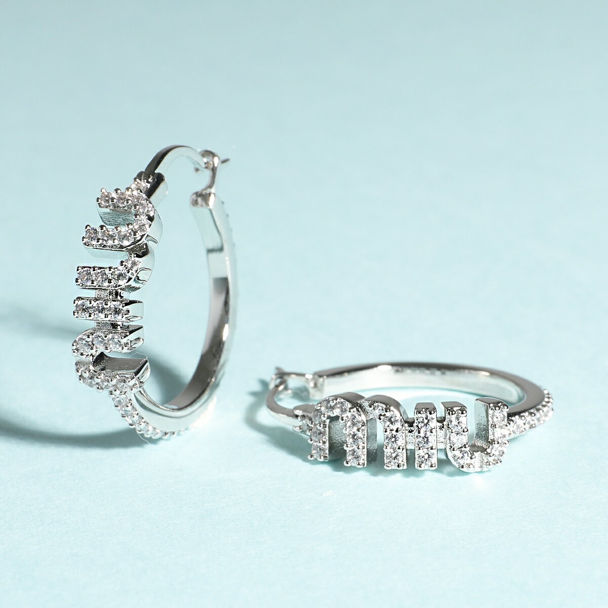 MIUMIU ミュウミュウ フープピアス 5IO107 2DNC レディース ロゴ クリスタル装飾 アクセサリー F0OKL/ACCIAIO+CRYSTAL【po_sannn】【dc_kikaku】のサムネイル