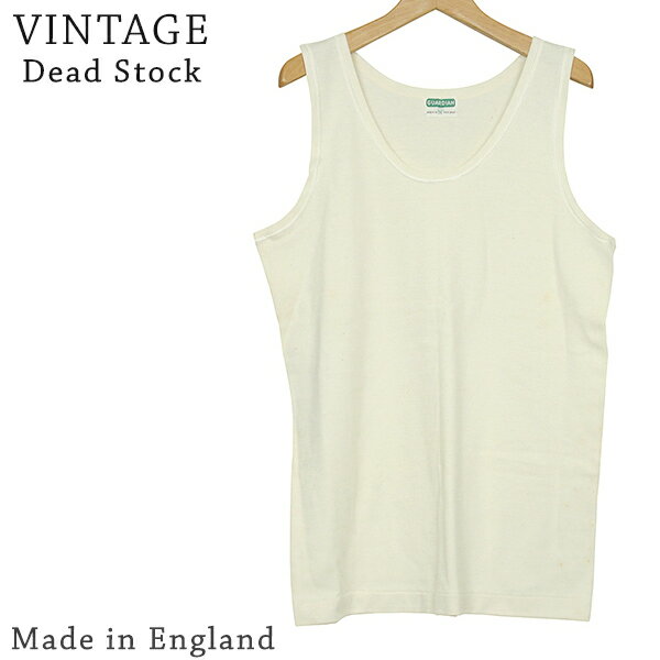 Dead Stock デッドストック 60S MADE IN ENGLAND GUARDIAN インターロック タンクトップ [NATURAL]です。 希少なMADE　IN ENGLANDのDEAD STOCKアイテムになります。 こちらは60-70年代ごろのGUARDIAN社製インターロック生地のタンクトップです。 表裏の両面ともに表目が見える両面編みのインターロック。 編み目が詰んでおり、弾性力が大きく、安定性にも優れており、着心地も抜群です。 ※DEAD STOCKの未洗いのため、生地にシミの汚れがございますのでご了承くださいませ。 ▼カラー:NATURAL (ナチュラル) ▼素材：コットン ▼生産国：MADE IN ENGLAND (英国製) ▼サイズ：36 □36 着丈 68.0cm / 身幅 47.0cm / 肩幅 34.0cm / 袖丈 袖なし ＊こちらの商品はメール便で発送可能です。 またレビューキャンペーンでの送料無料を選択したお客様はメール便にて発送いたします。(ポスト投函となりますので [あす楽・日時指定・代金引換 ] は対応できません)Dead Stock (デッドストック) / 60S MADE IN ENGLAND GUARDIAN インターロック タンクトップ [NATURAL] 希少なMADE　IN ENGLANDのDEAD STOCKアイテムになります。 こちらは60-70年代ごろのGUARDIAN社製インターロック生地のタンクトップです。 表裏の両面ともに表目が見える両面編みのインターロック。 編み目が詰んでおり、弾性力が大きく、安定性にも優れており、着心地も抜群です。 ※DEAD STOCKの未洗いのため、生地にシミの汚れがございますのでご了承くださいませ。 ▼ 商品スペック 商品名 Dead Stock デッドストック 60S MADE IN ENGLAND GUARDIAN インターロック タンクトップ [NATURAL] ブランド Dead Stock (デッドストック) 品番 - カラー NATURAL (ナチュラル) 素材 コットン サイズ 36 生産国 MADE IN ENGLAND (英国製) 備考 ※DEAD STOCKの未洗いのため、生地にシミの汚れがございますのでご了承くださいませ。 ▼ サイズ表 着丈 身幅 肩幅 袖丈 36 68.0 47.0 34.0 袖なし →サイズの測り方について