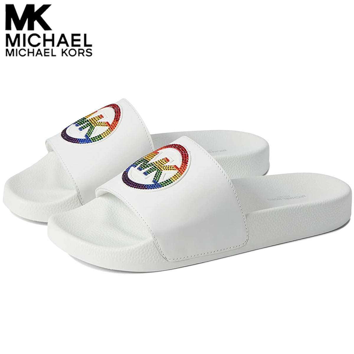 ■商品名 マイケルコース ジェイク ロゴ スライド サンダルMichael Kors Jake Logo Slide Sandal ■カラー Optic White Multi ■素材 Rubber upper, no lining, rubber sole ■商品詳細 ・オープントゥ・スリップオン ■ 商品説明 マイケル・コースは、カジュアルルックを新しいレベルに引き上げます。ジェイク・ロゴ・スライドで、スタイリッシュにリラックスするのに最適なアイテムです。 カリスマデザイナー ！マイケル・コース(MICHAEL KORS) セリーヌ CELINE のデザイナーに抜擢された際、ブランドイメージのの若返り、復活に貢献。現代的で都会派キャリアウーマンの支持するブランドに変えたファッション業界のカリスマ。エミー賞のランウェイ審査員も勤める超有名人です。偽物・コピー商品にご注意 世界の人気ブランドは偽物・コピー商品の生産も盛んです。激安価格や偽公式サイトにはご注意ください。 当店の商品は『 100% 正規品保障！ 』です。安心してお買い物をお楽しみください。 Michael Kors マイケルコース ⇒　ブランドページはこちらから 後払い対応店 商品到着後「14日以内のお支払いでOK !」 ご注文時にお支払い方法より選択しご利用いただけます。