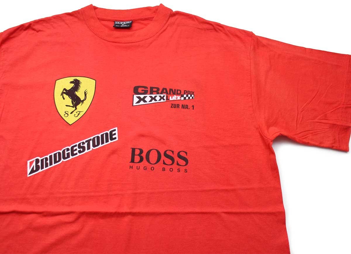 00s GRAND PRIX Ferrariフェラーリ BRIDGESTONE HUGO BOSS ロゴ 両面プリント コットンTシャツ 赤 XL 【中古】