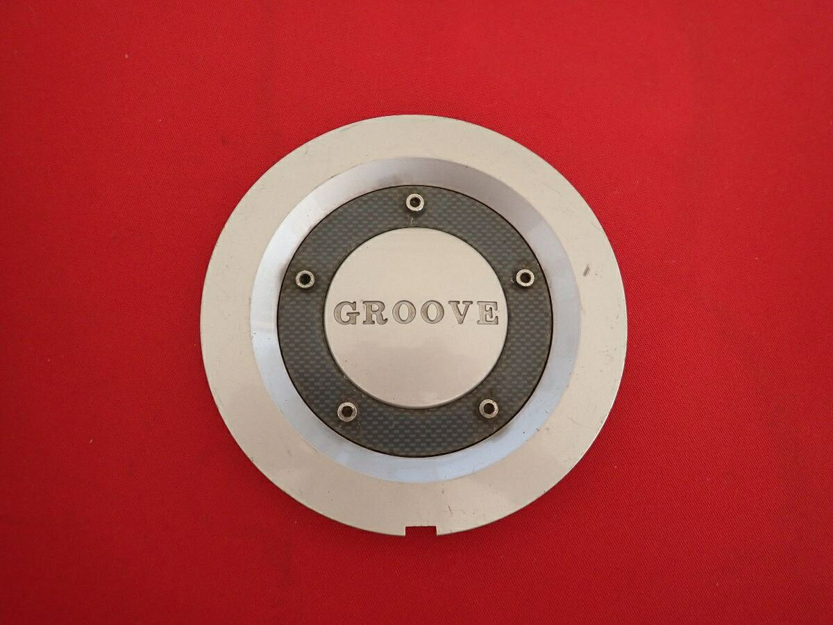 ●商品情報 GROOVE 中古センターキャップ1枚の出品です。全体的にキズ、変色またはくすみがあります。プラスチック製、銀色×グレー色です。☆キャップを傷つけてしまった方、破損してしまった方、いつの間にか知らないうちに飛んで行って失くしてしまった方、経年劣化により使用出来なくなってしまった方など、単品でお探しの方におススメです！！☆【寸法・程度について】【程度について】キズ等の程度につきましては画像にてご確認ください。表記は省略させて頂いておりますのでご了解ください。【寸法】※すべて実測値です画像にてご確認下さい。測定個所は下記の部分となります。全幅(直径)・裏面取付部径・厚さ(高さ)ジャンクCP5205818 社外 キャップ 商品番号 P005205818 （お問い合わせの際にはこの番号をお伝え下さい） 部品名 キャップ 証明書 無 保証書 なし 取扱説明書 無 当店評価 ジャンクC スペック 送料（税別） 1,000円 ※沖縄県や離島の場合は中継料が加算されます 当店は中古専門店です。商品画像をよくご確認の上ご購入下さい。 お気に召しませんでしたか？ 当店には数万点の商品があります。 他の商品もぜひご検討ください。 この店舗の他の商品も見てみる