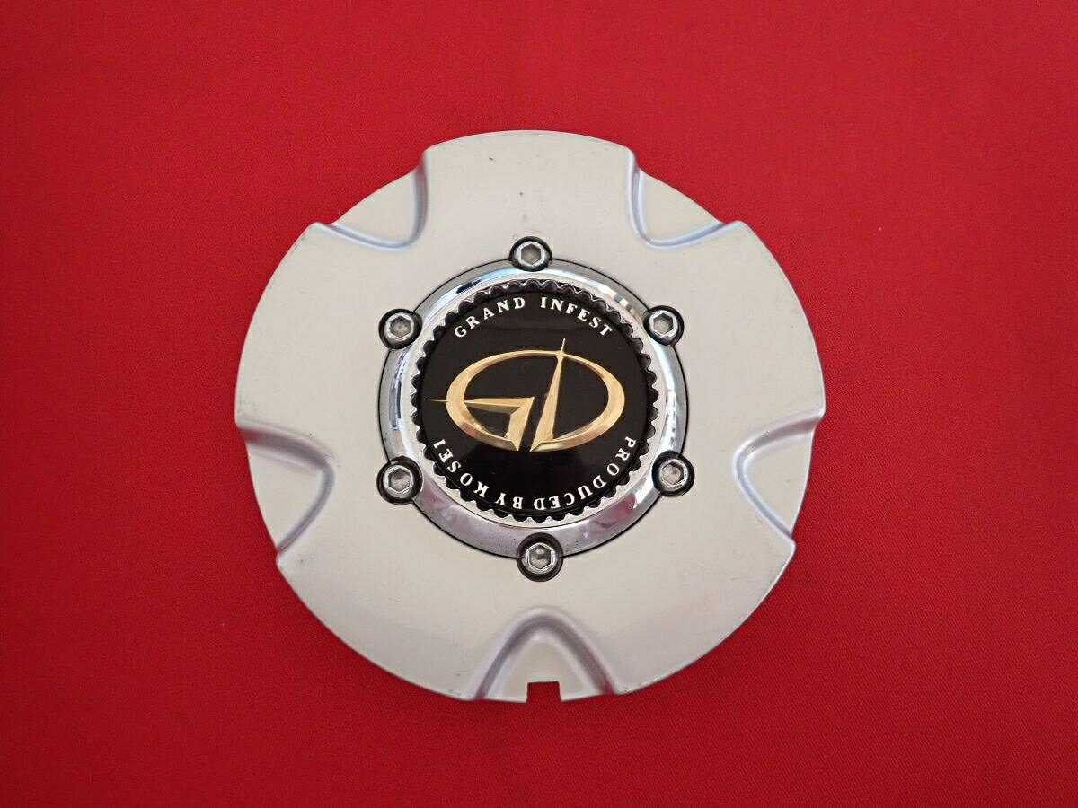 ●商品情報 KOSEI GRAND INFEST コーセイ グランド インフェスト中古センターキャップ1枚の出品です。全体的にキズ、変色またはくすみがあります。プラスチック製、銀色×黒色です。刻印 GRAND INFEST M9☆キャップを傷つけてしまった方、破損してしまった方、いつの間にか知らないうちに飛んで行って失くしてしまった方、経年劣化により使用出来なくなってしまった方など、単品でお探しの方におススメです！！☆【寸法・程度について】【程度について】キズ等の程度につきましては画像にてご確認ください。表記は省略させて頂いておりますのでご了解ください。【寸法】※すべて実測値です画像にてご確認下さい。測定個所は下記の部分となります。全幅(直径)・裏面取付部径・厚さ(高さ)ジャンクCP5205844 社外 キャップ 商品番号 P005205844 （お問い合わせの際にはこの番号をお伝え下さい） 部品名 キャップ 証明書 無 保証書 なし 取扱説明書 無 当店評価 ジャンクC スペック 送料（税別） 1,000円 ※沖縄県や離島の場合は中継料が加算されます 当店は中古専門店です。商品画像をよくご確認の上ご購入下さい。 お気に召しませんでしたか？ 当店には数万点の商品があります。 他の商品もぜひご検討ください。 この店舗の他の商品も見てみる